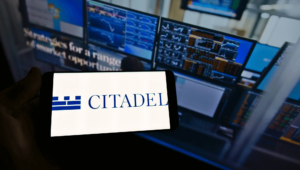 Citadel Securities takes a USD 400 million stake in Crypto.com at a USD 20 billion valuation, the exchange's first institutional funding round.