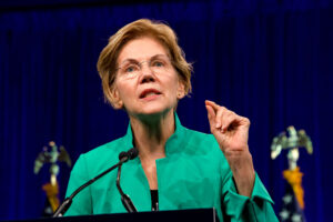 Senator Warren accuses the OCC of granting illegal trust bank charters to nine crypto firms, including Coinbase and Ripple, citing the National Bank Act.
